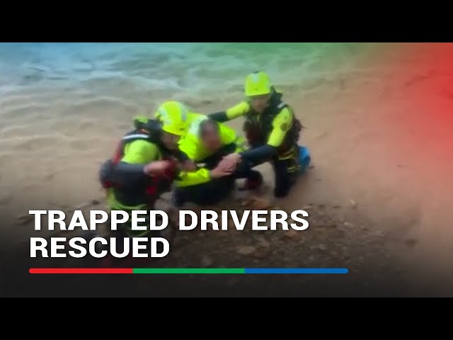 ⁣Trapped drivers rescued as heavy rain hits Spain | ABS-CBN News