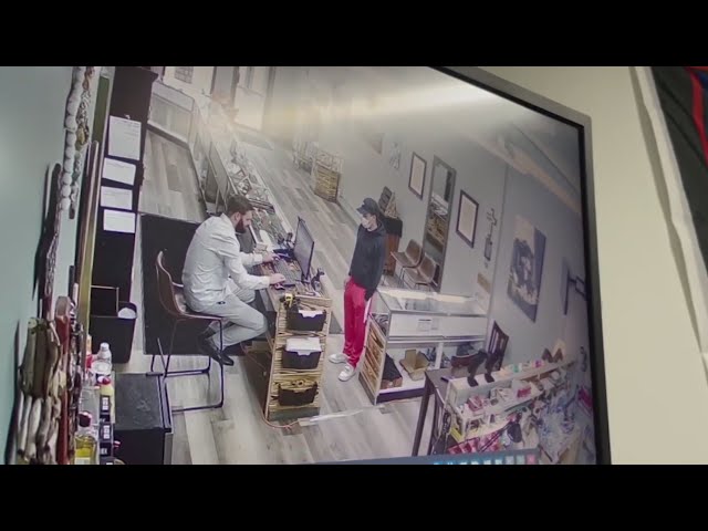 ⁣Surveillance video shows armed, dangerous suspect in Centennial jewelry store robbery