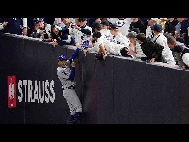 ⁣Yankees fan rips ball out of Mookie Betts' glove during World Series Game 4