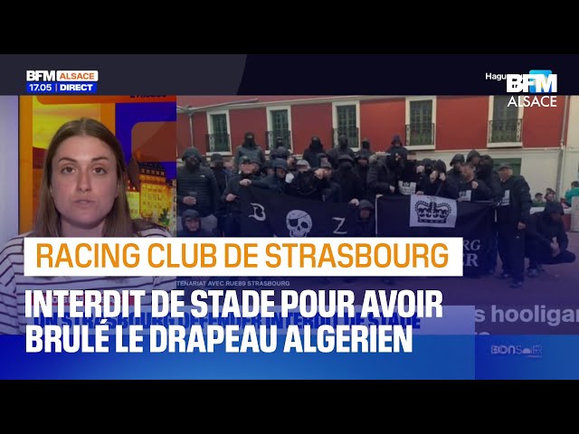 ⁣Un membre d'un groupe d'hooligan du Racing Club de Strasbourg brûle le drapeau algérien