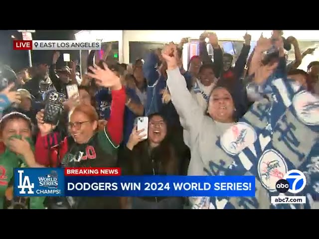 ⁣Fans in East LA celebrate the Dodgers winning the World Series