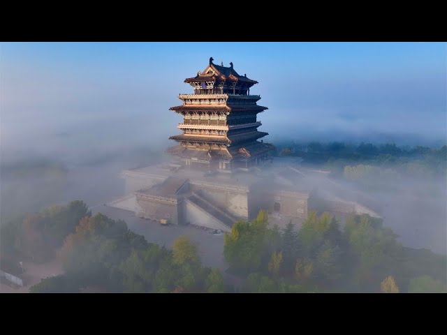 Mystical advection fog envelops N China's Guanque Tower