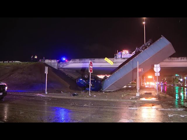 ⁣Semi-truck dangles over Texas highway