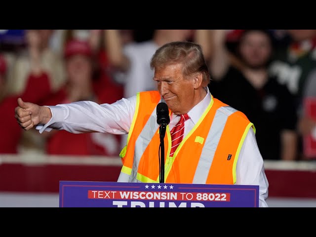 ⁣Trumps wears safety vest to troll Biden over 'garbage' remark