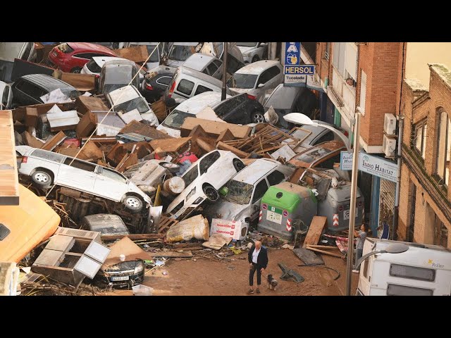 ⁣Video shows crushed cars, destruction after Spain floods that killed dozens