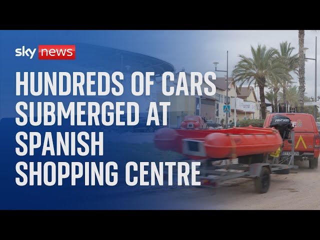 ⁣Scuba divers sent to help search and rescue at a flooded carpark in Spain