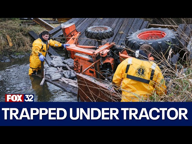 ⁣Man in serious condition after being trapped under tractor in Woodstock creek: officials