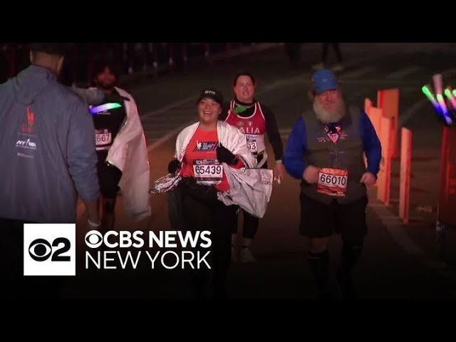 ⁣Final runners cross the finish line at memorable TCS NYC Marathon