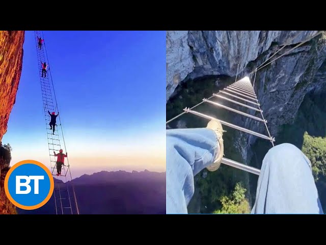 ⁣This giant ladder is suspended 5000 feet in the air