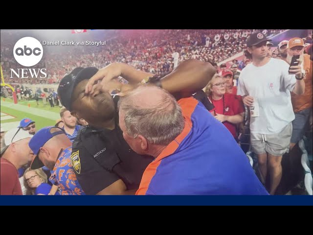 ⁣Police and fans clash at Georgia-Florida college football game