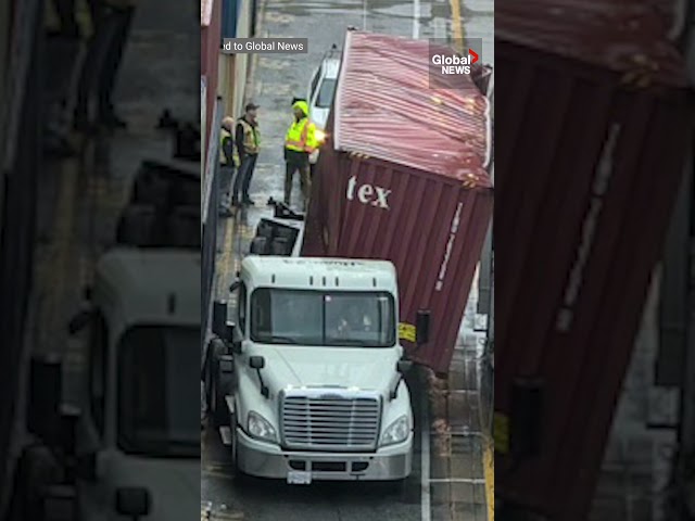 ⁣Knocked over shipping container smashes truck at BC port