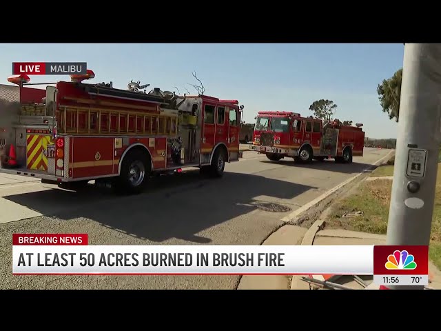 ⁣Brush fire burns along Malibu coast