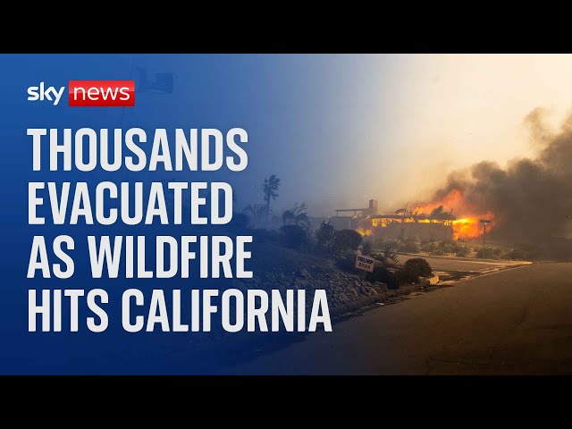 ⁣Thousands evacuated as powerful wildfire burns homes in Southern California