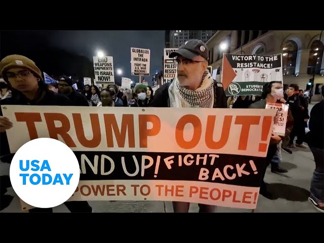 ⁣Protesters march in front of Chicago's Trump tower | USA TODAY