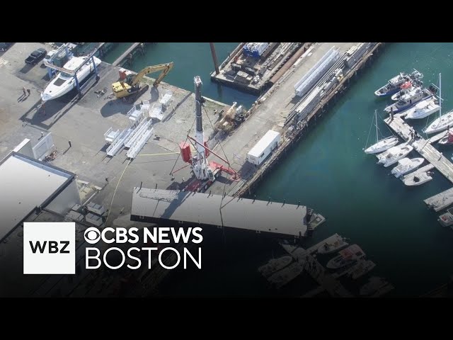 ⁣Boat in Boston Harbor crushed in crane collapse