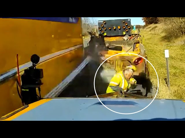 ⁣Road worker narrowly avoids being hit by truck on side of highway in New York