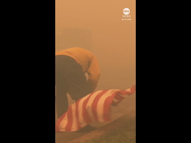 ⁣Firefighter saves American flag from SoCal fire