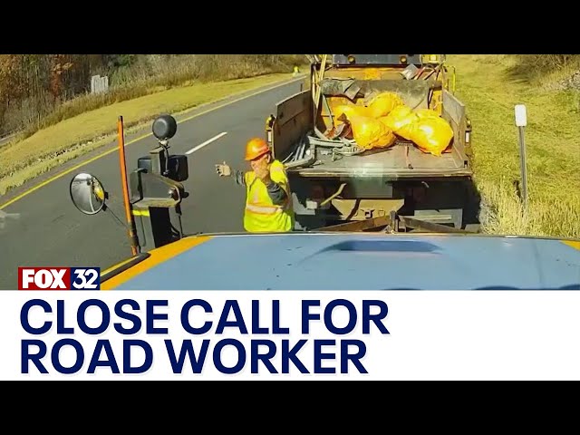 ⁣Across America: Road worker nearly hit by truck