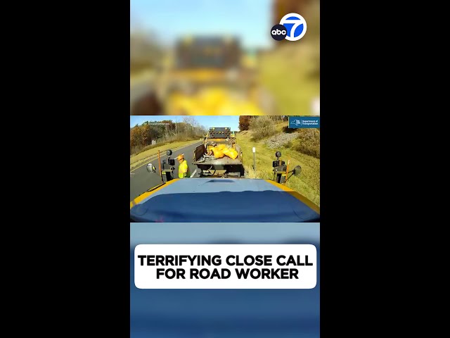 ⁣Close call! Road worker almost hit by box truck