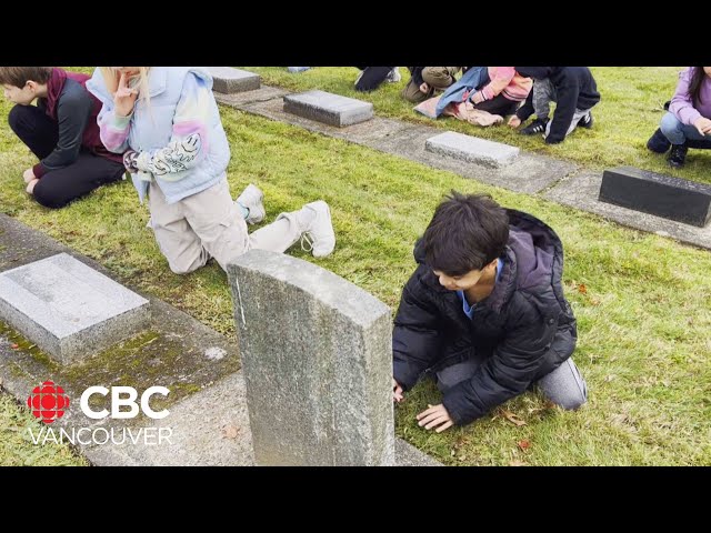 ⁣Hundreds of elementary students learn about soldiers' sacrifices at military cemetery