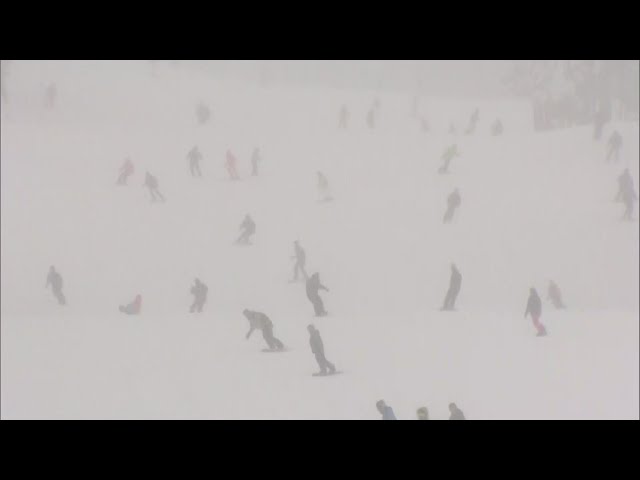 ⁣Joyful skiers enjoy opening day at Breckenridge during Colorado snowstorm