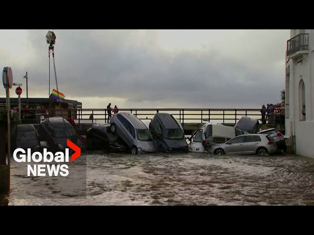 ⁣Spain floods: Intense rains sweep away Catalonia cars, days after Valencia catastrophe