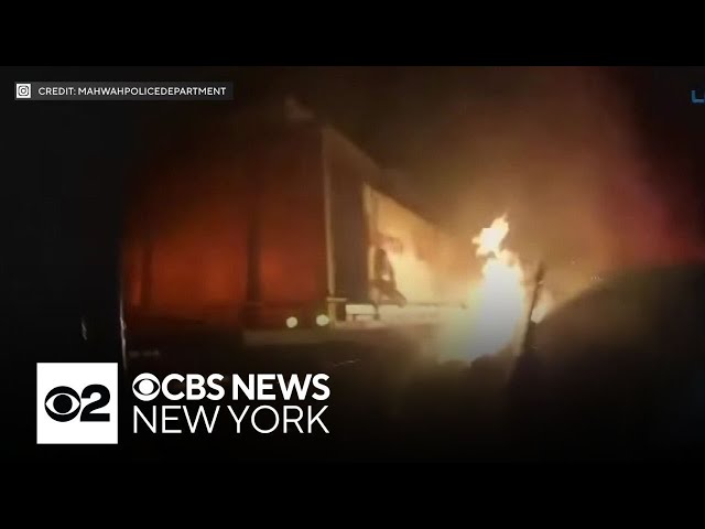 ⁣Videos show N.J. police officers rescue driver from fiery crash