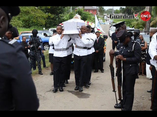 ⁣Slain cop laid to rest with military funeral and Hindu rites