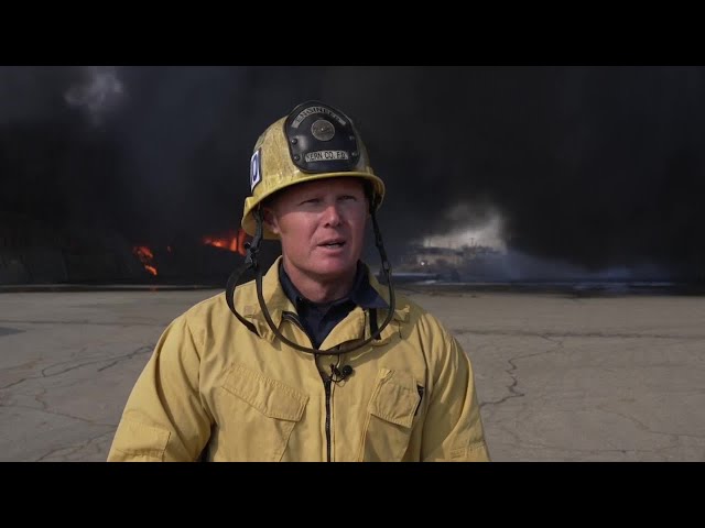 ⁣Two-alarm fire burning two warehouses in East Bakersfield