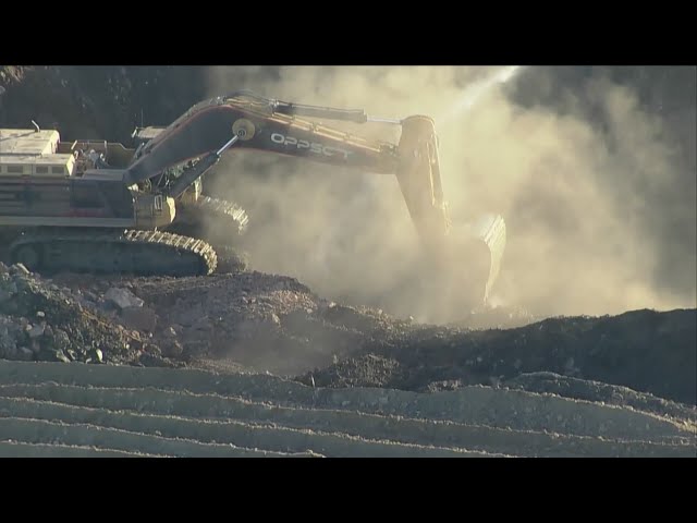 ⁣Coal seam fire visible as crews mitigate burn impacts