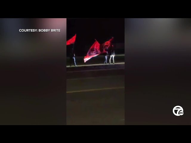 ⁣Masked men wave Nazi flags, use antisemitic and racial slurs outside American Legion in Howell