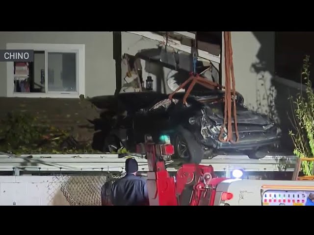 ⁣Car flies off road, lands on second floor of house in Chino