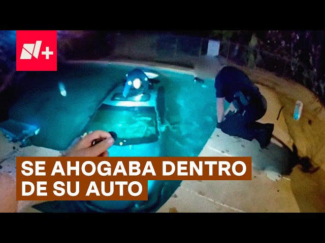 ⁣Policía rescata a hombre atrapado en auto hundido - N+