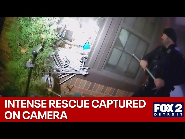 ⁣Intense body cam footage shows moment police save elderly couple from house fire