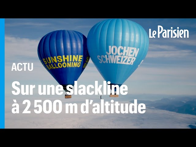 ⁣Ils jouent les funambules à 2 500 mètres d’altitude entre deux montgolfières