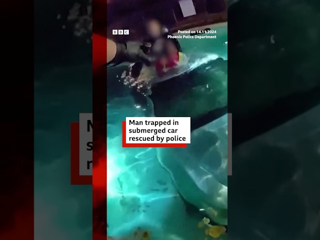 ⁣US man rescued from car submerged in pool. #US #Police #BBCNews