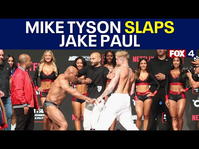 ⁣Mike Tyson slaps Jake Paul at fight weigh-in