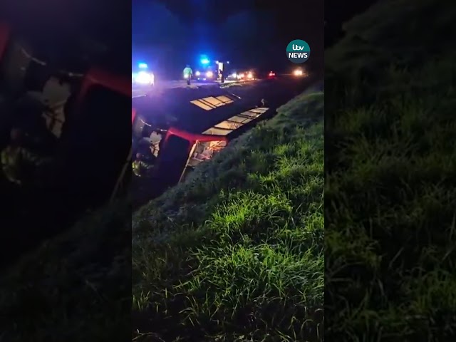 ⁣CCTV shows 'scary' moment school bus overturns into water-filled ditch near Wisbech