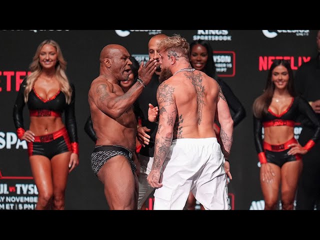 ⁣Mike Tyson slaps Jake Paul in face during weigh-in ahead of boxing match