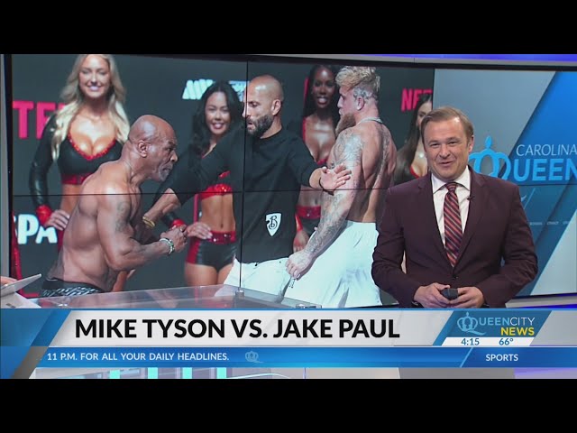 ⁣Jake Paul and Mike Tyson face off in a boxing event