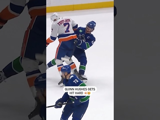 ⁣Quinn Hughes Gets Hit HARD 