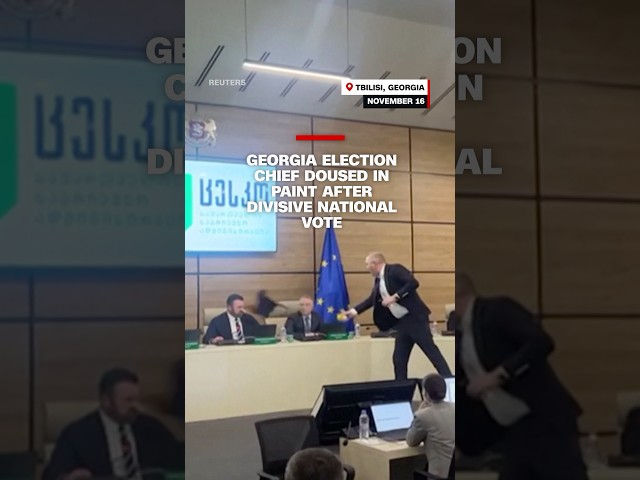 ⁣Georgia election chief doused in paint after divisive national vote