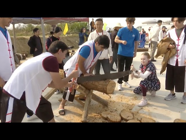 ⁣Global participants experience traditional Chinese farming at national agri-fitness competition