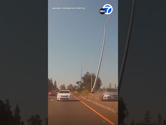 ⁣Streetlight snaps off, flies through air during crash on NorCal highway