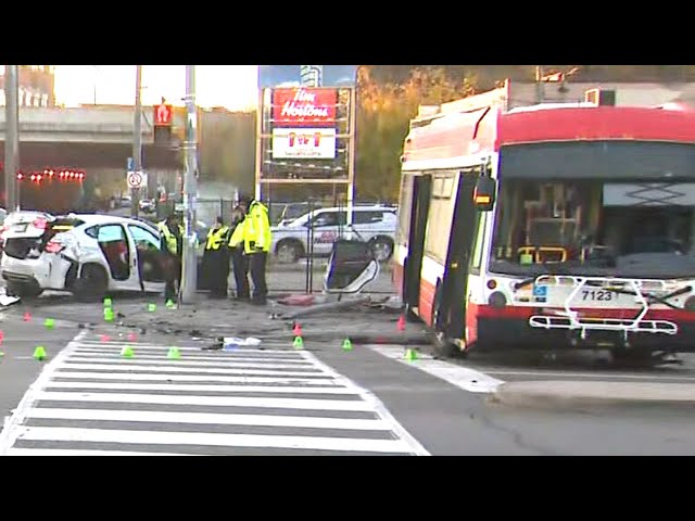 ⁣'Horrific scene': Stolen BMW crashes into Toronto transit bus, leaving several people inju