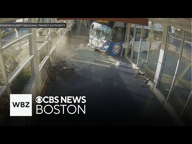 ⁣Surveillance video shows bus crashing into Massachusetts terminal, trapping man underneath