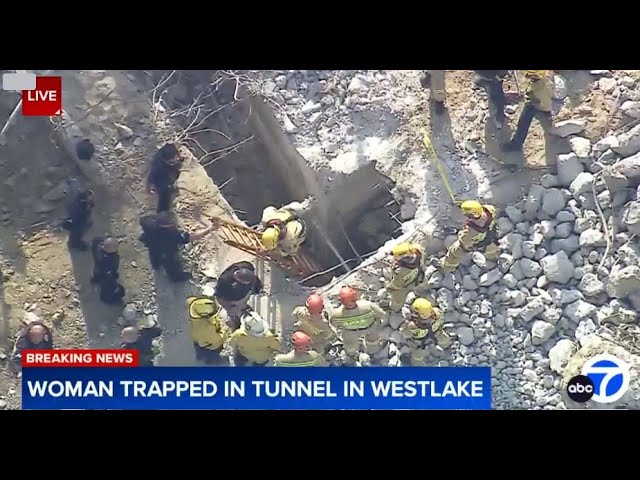 ⁣LIVE: Firefighters working to rescue woman trapped in tunnel in Westlake