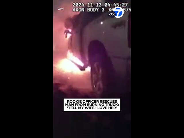 ⁣Rookie police officer rescues man from burning truck, video shows