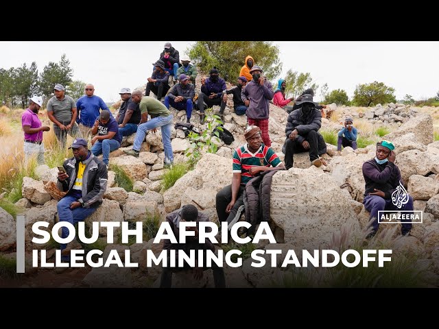 ⁣South Africa illegal mining standoff: Police plan to remove miners from underground