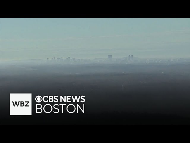 Brush fire smoke clouds skies around Boston